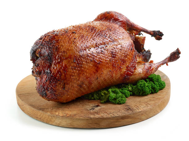 istock freshly roasted duck roast isolated on white background 1292814885