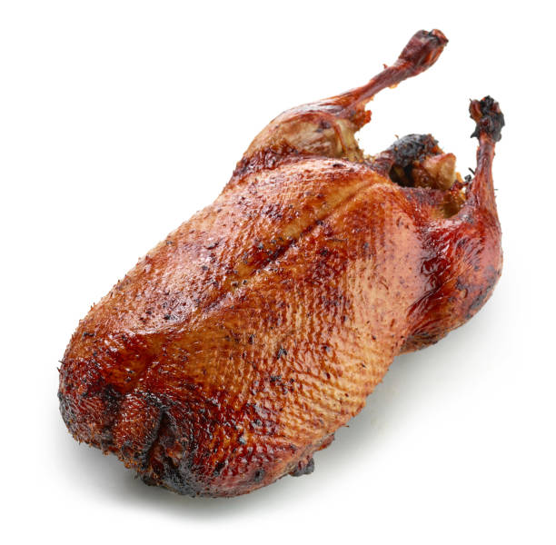 istock freshly roasted duck roast isolated on white background 1292814888
