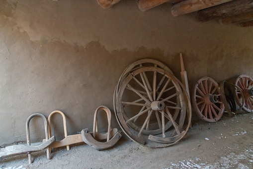 Old adobe walls and wheels