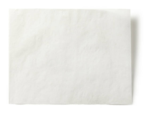 istock white baking paper sheet isolated on white background, top view 1292815048