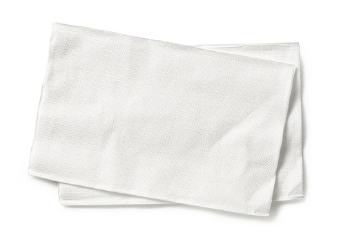servilletas de papel blanco aisladas sobre fondo blanco, vista superior photo