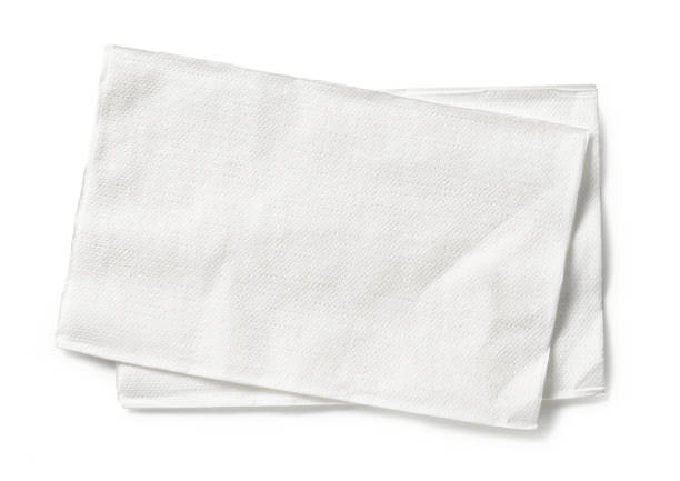 guardanapos de papel branco isolados em fundo branco, vista superior - napkin - fotografias e filmes do acervo
