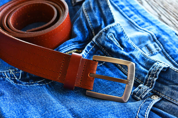 istock Leather Belt and Faded Blue Jeans 1292815641