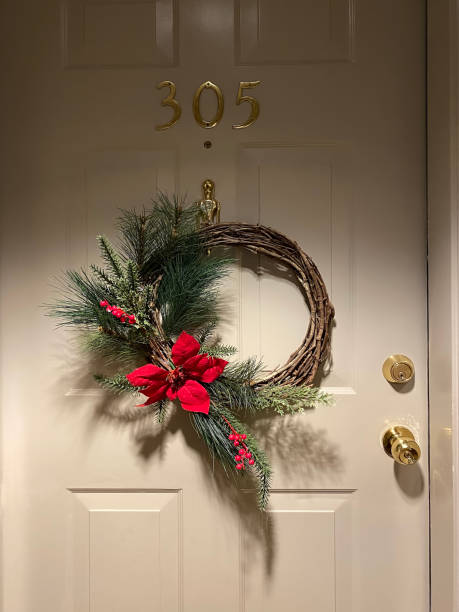 istock Christmas wreath on door 1292818654