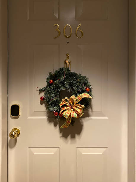 istock Christmas wreath on door 1292818658