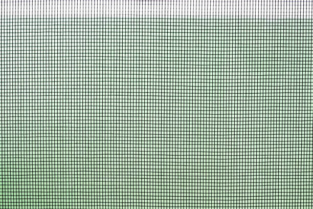 istock Texture of metal net  in seamless square patterns on background 1292822917