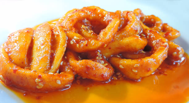 istock squid in teriyaki sauce with sesame seeds and chili 1292829279