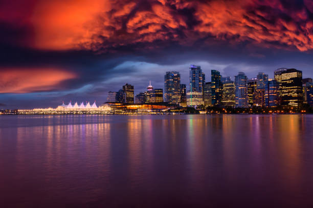 View of Coal Harbour in Downtown Vancouver View of Coal Harbour in Downtown Vancouver, British Columbia, Canada, after Sunset. Modern City Skyline during Night. Dramatic Sky Artistic Render vancouver at night stock pictures, royalty-free photos & images