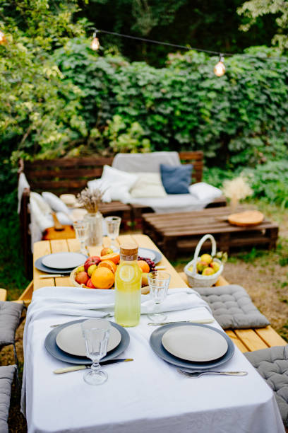 istock table served in the garden for a family dinner. a romantic dinner 1292835342