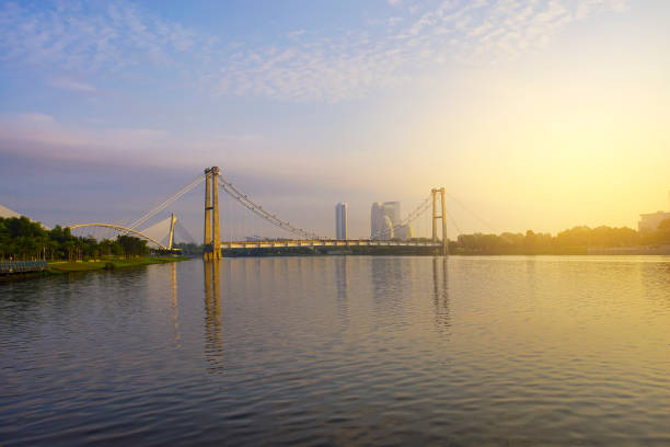 istock Unfinished underconstruction bridge for train usage in putrajaya during sunrise 1292835963