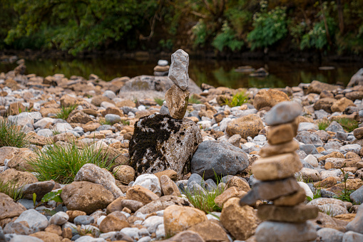 Cairn on the shore of the River Wharfe in Hubberholme, North Yorkshire, England, UK