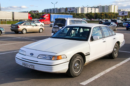 Moscow, Russia - September 29, 2012: Full-size American saloon car Ford Crown Victoria in the city street.