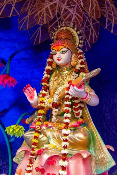 Goddess Saraswati idol decorated at Puja pandal, Saraswati symbolizes creative energy and is considered as the goddess of knowledge, music, art, wisdom, and learning.
