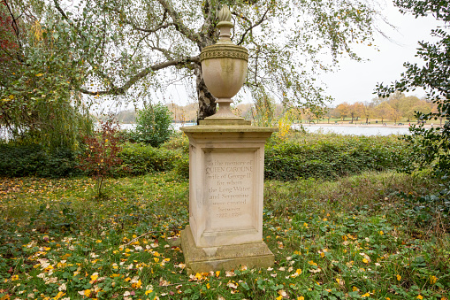 This stone urn was unveiled by Elizabeth II in 1990 and is mounted on a plinth overlooking the east end of the Serpentine and is a memorial to Queen Caroline, consort of George II. She is credited with creating the Serpentine and the Long Water in Kensington Gardens between 1726-1730.