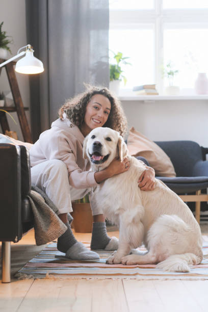 istock Woman loving her dog 1292846318