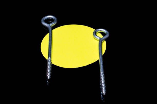 Assorted screws on a black background