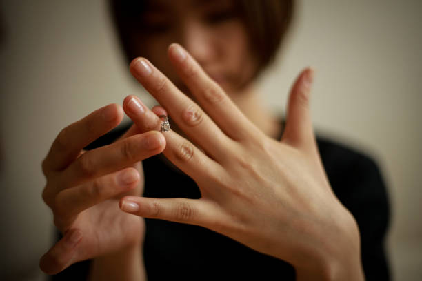 istock Woman removing the ring 1292851654
