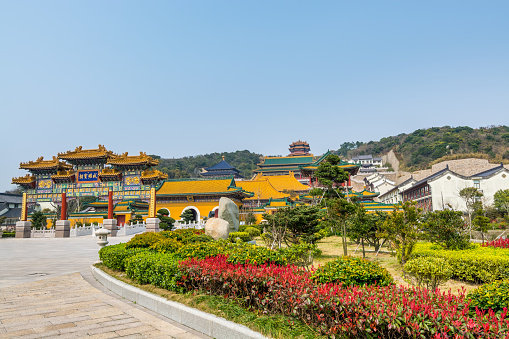 Chinese traditional colorful Baotuo lecture temples in the Putuoshan mountains, Zhoushan Islands,  a renowned site in Chinese bodhimanda of the bodhisattva Avalokitesvara (Guanyin)
