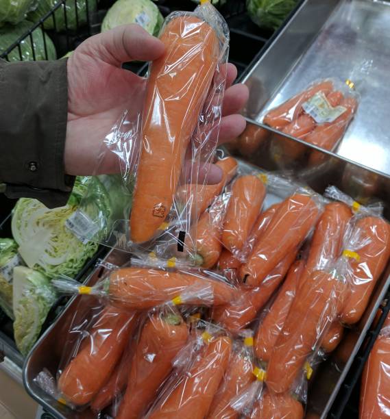 istock Individually wrapped carrots in Japanese grocery store 1292854658