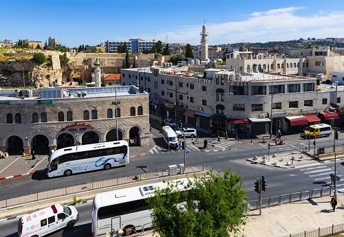 East Jerusalem, Palestine, May 5, 2019: Aerial view of the the Sultan Suleiman Street with the Hotel Golden Walls in East Jerusalem near to Old City. This busy street is the center of the Palestinian community in Jerusalem.