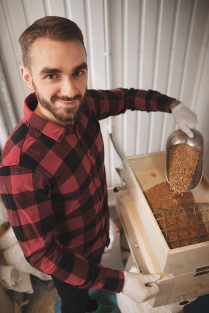 istock Brewer working at craft beer factory 1292859364