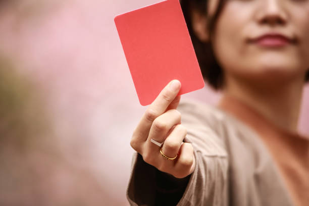 istock Woman issuing a red card 1292860466