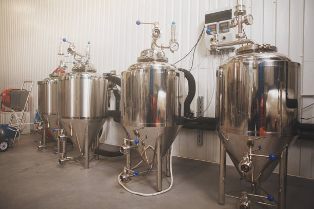 istock Small beer tanks at craft beer factory 1292860624