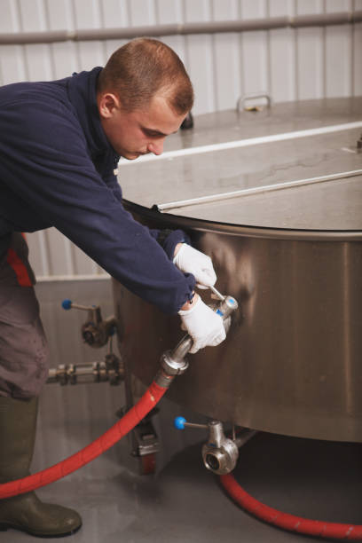 istock Brewer working at craft beer factory 1292860765