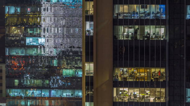 istock Scenic glowing windows of skyscrapers at evening 1292868183