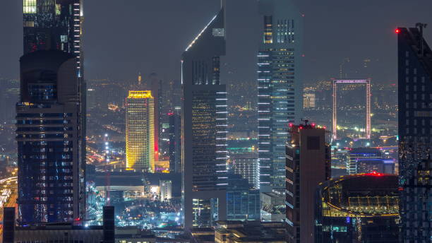 istock Commercial business district in a summer night . Dubai, UAE 1292868778