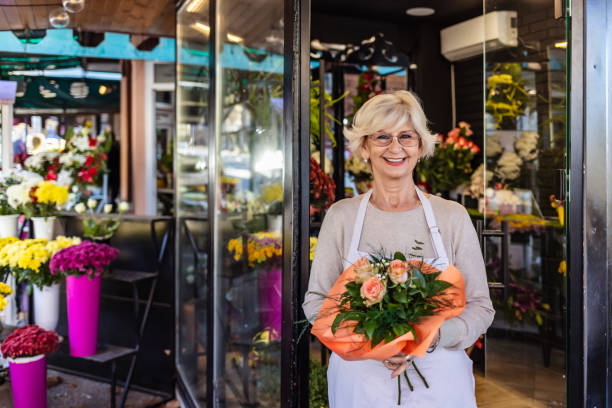 istock Florist showing beautiful bouquet 1292869305