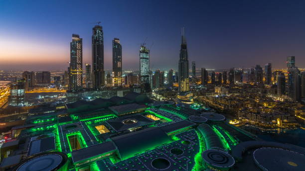 istock Dubai downtown night to day . Top view from above 1292870475
