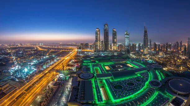 istock Dubai downtown night to day . Top view from above 1292870504