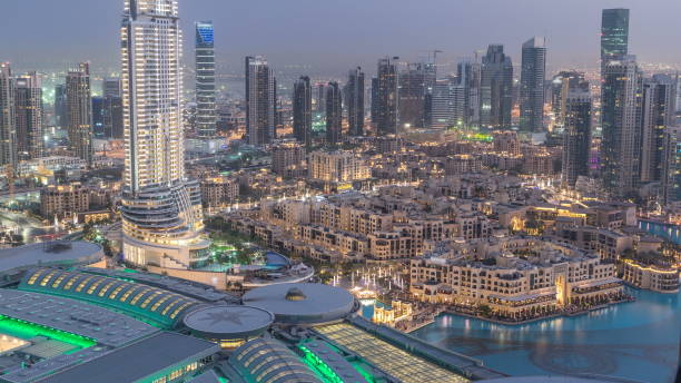 istock Dubai downtown day to night . Top view from above 1292870550