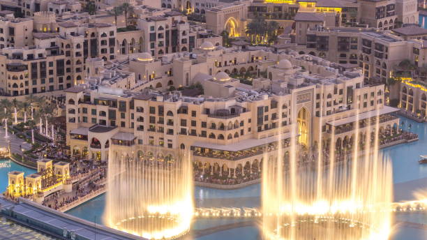istock Dubai downtown day to night . Top view from above 1292870679