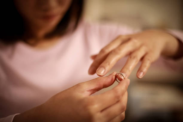 istock Woman removing the ring 1292871389