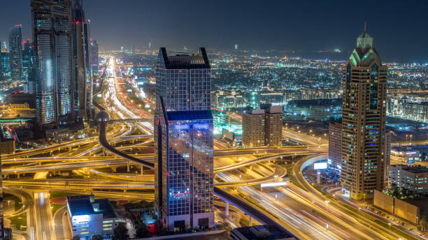 istock Night traffic on a busy intersection on Sheikh Zayed highway aerial 1292877383