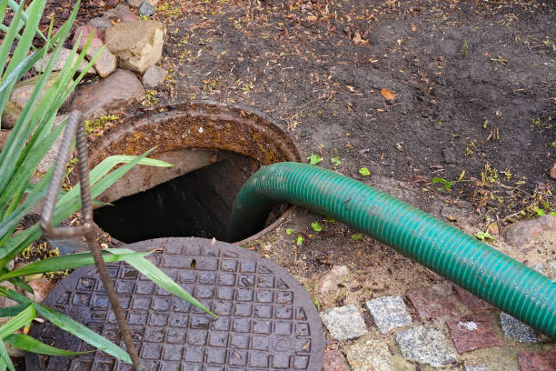 istock pumping septic tanks from the backyard tank in the countryside 1292879961