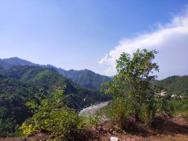 istock The rich road passing through the poor village 1292881611