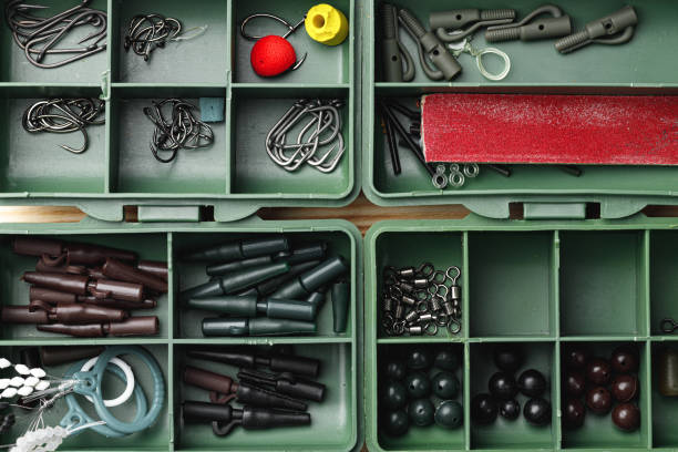 istock Plastic compartment case and fishing tackle top view 1292882944