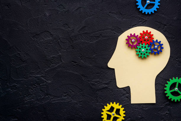 istock Human brain as puzzle of gears and cogs, top view 1292885778