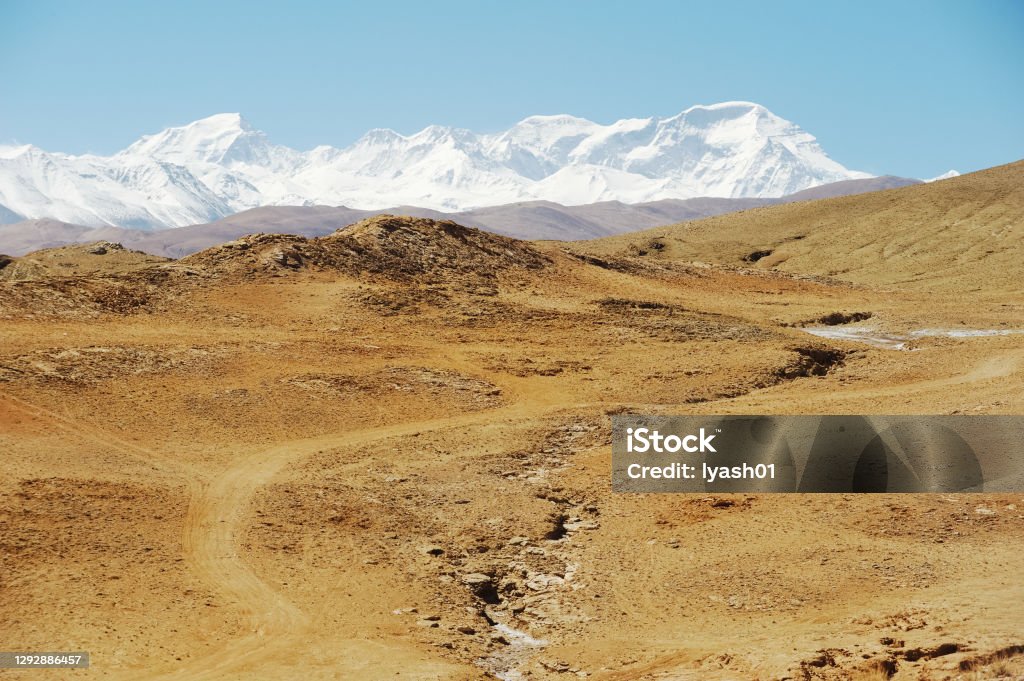 Mountains of Himalayas, young beautiful high mountains of Tibet. Mountains of the Himalayas, young beautiful high mountains of Tibet. Abandoned Stock Photo