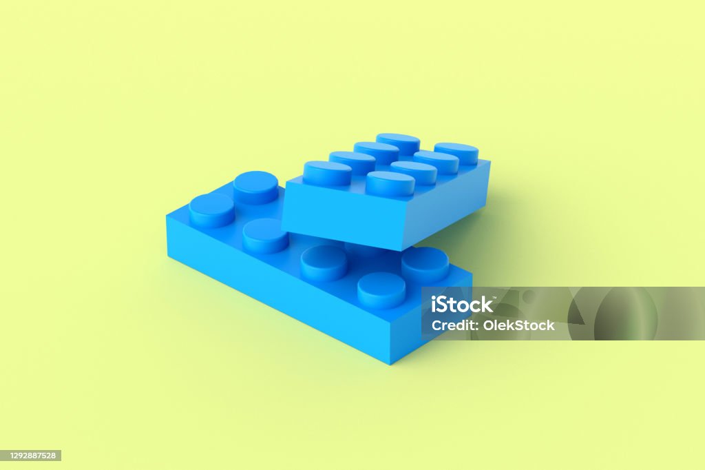 Blue Plastic Toy Blocks On Yellow Background Rectangular Shape ...