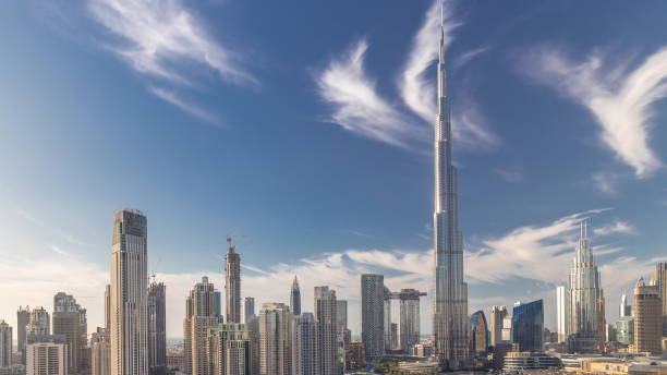 istock Dubai Downtown skyline timelapse with Burj Khalifa and other towers paniramic view from the top in Dubai 1292889333
