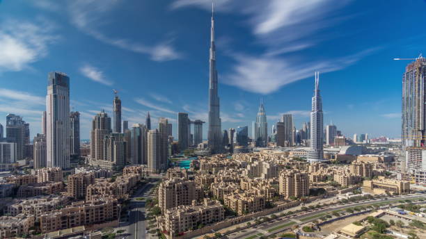 istock Dubai Downtown skyline timelapse with Burj Khalifa and other towers paniramic view from the top in Dubai 1292889532