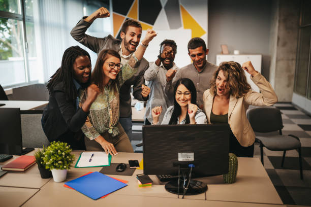Business people smile and raise hands up