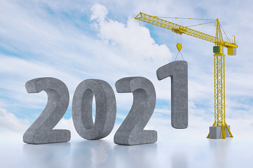 Build the Future Concept. Tower Crane with 2021 Year Sign on a cloud background. 3d Rendering