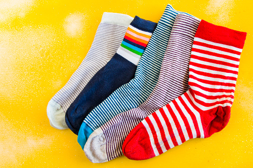 Down syndrome symbol colorful socks with lines, down syndrome day