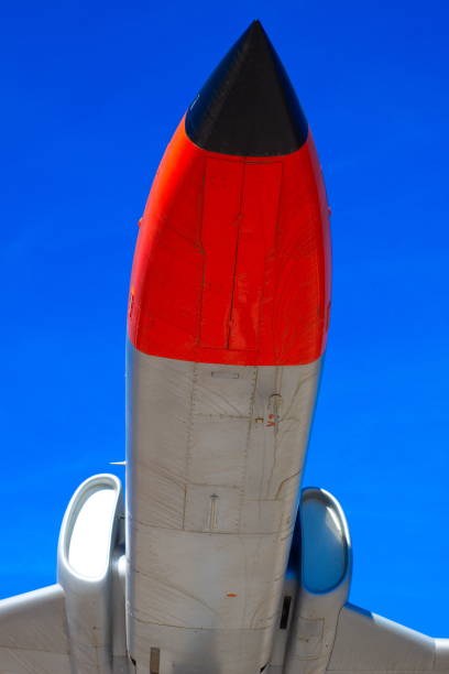 istock Low-flying jet plane on a sunny day 1292895504
