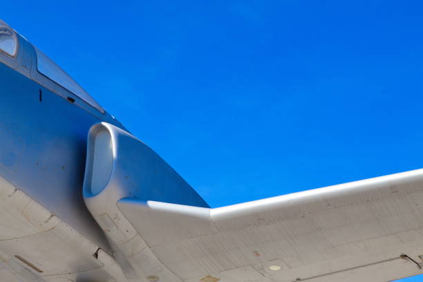 istock Low-flying jet plane on a sunny day 1292895512